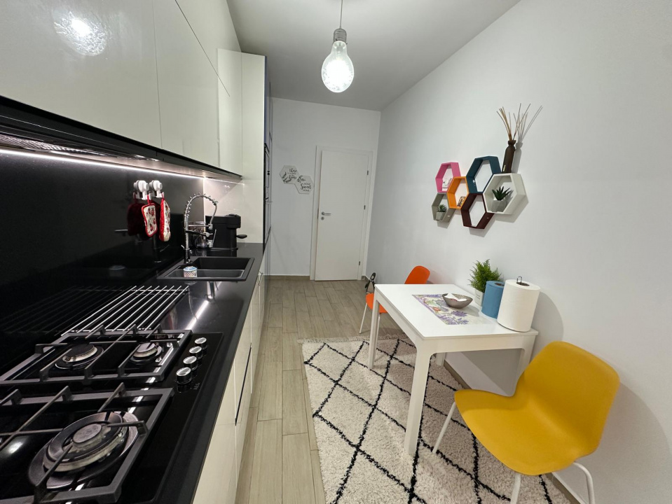 Apartament 2 camere cu loc de parcare si terasa EvoCasa Optima Titan